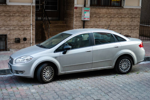 Fiat Linea car parking in the street Istanbul,Turkey July 11,2018:Fiat Linea car parking in the street little fiat car stock pictures, royalty-free photos & images