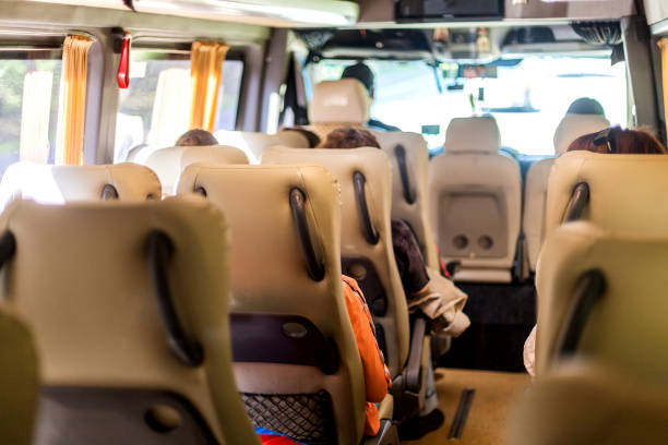 seats inside the minivan - bus transportation indoors people imagens e fotografias de stock