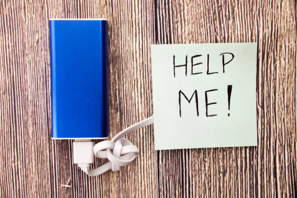 istock Help Me note and energy bank is present in the picture.image has an assistance note, people are helped when they need in different conditions. Charity Donation or Helping Concept is given. 998058894