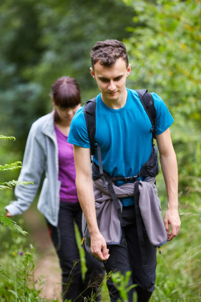 istock Group of people hiking on a trail 998078054