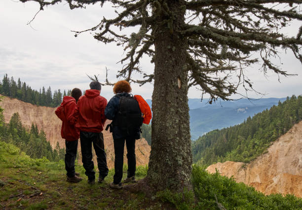 istock People hiking at the Rusty Pit, Romania 998078204