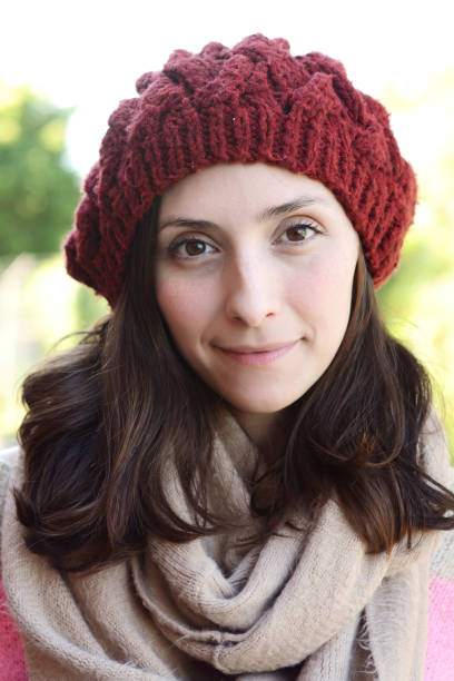 istock Woman winter portrait against a brick wall. 998081096