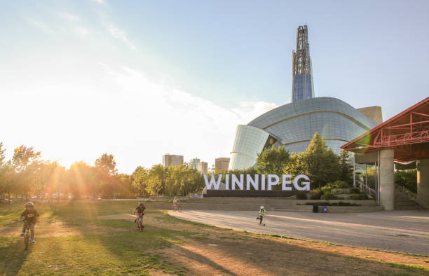 Beautiful view of Canadian Museum for Human Rights with children playing around. Summer feeling. Winnipeg, Manitoba/Canada manitoba photos stock pictures, royalty-free photos & images