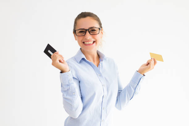 istock Positive female shopper holding several loyalty cards 998092748