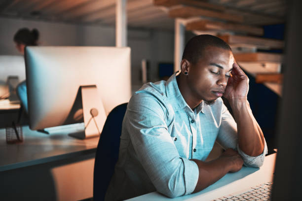 istock These late nights are getting to him 998093854
