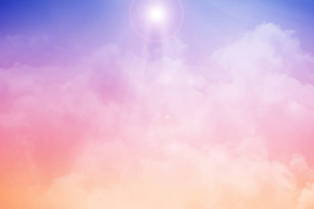 istock artistic cloudy sky with pastel gradient color and lens flare, nature abstract  background 998149130