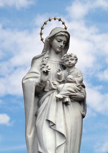 Statue of Virgin Mary with little Jesus Christ  in her arms.