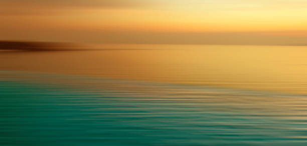 istock Blurred background of refraction in water. Panoramic dramatic view of Infinity Swimming Pool. 998185328