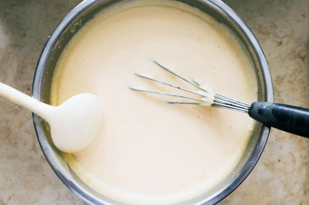 istock Mixing batter or dough for pancake or making desserts.Close up ,soft focus 998185960