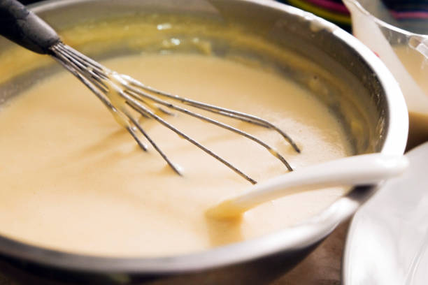 istock Mixing batter or dough for pancake or making desserts.Close up ,soft focus 998186360