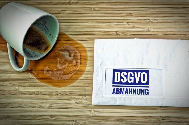 letter with in german achtung dsgvo-abmahnung in english attention dsgvo (gdpr) warning - infringe imagens e fotografias de stock