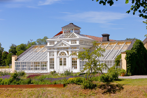 Mariefred, Sweden - July 2, 2018: Exterior of the greenhouse at Gripsholm Castle.