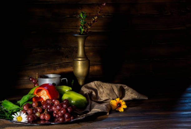 istock Still life with retro cup and vase and grapes 998217330