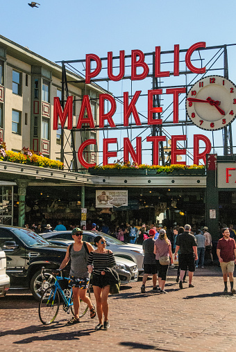 Seattle, WA. July 18, 2017. Busy people shopping at the Public Farmers market in Pike Street in Down Town Seattle. Pike street market is famous for it's fresh daily produce.