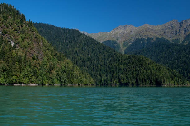 istock lake Ritsa in the mountains 998230690