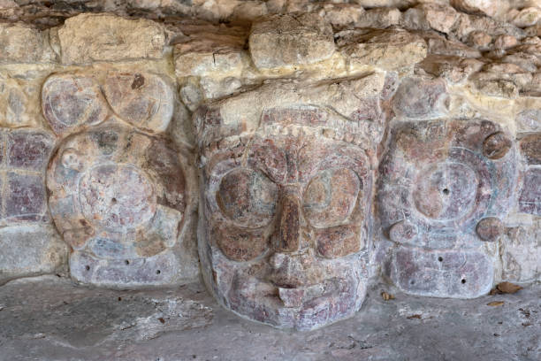 istock Stone mask at Maya archeological site Edzna, Mexico 998240758