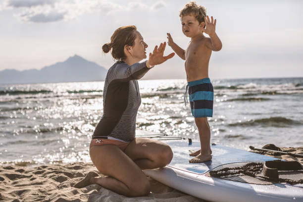 istock Surfing Lessons for my little one 998241158