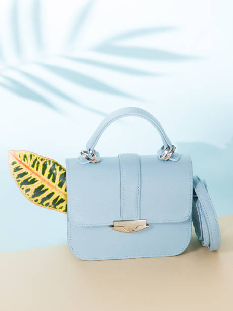 istock Light blue fashion bag with leave 998261202