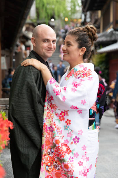 istock Foreign couple enjoying visit to Japan 998264542