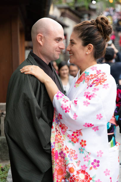 istock Foreign couple enjoying visit to Japan 998264872
