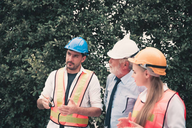 istock Architect designer and engineer discussing their project and site visit, Business construction concept 998268968