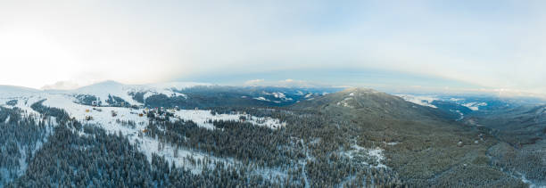 istock Aerial Flight Mountain Clouds Sunrise Beautiful Morning Peaks 998279956