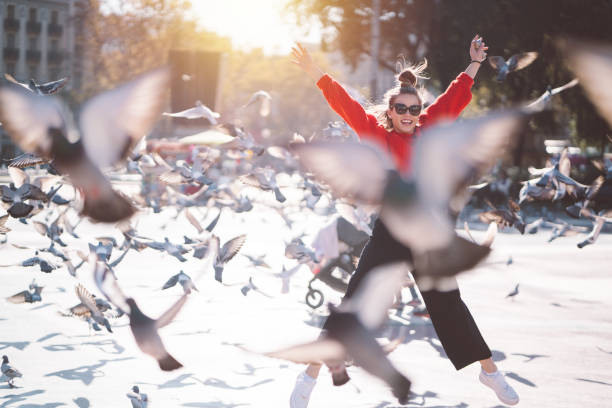 istock Girl jumping from joy in Barcelona 998285100