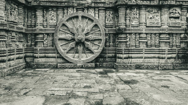 Stone wheel Intricate carvings on a stone wheel in the ancient  Hindu Sun Temple at Konark, Orissa, India. 13th Century AD dravidian culture photos stock pictures, royalty-free photos & images