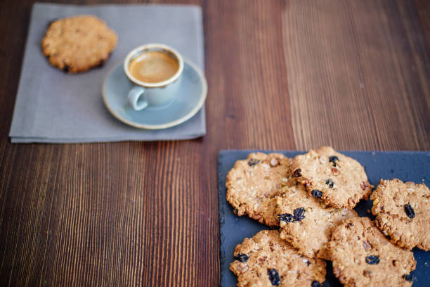 istock Cup of coffee and cookies. 998297180