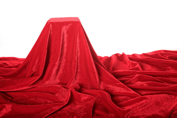 istock Close up empty red velvet pedestal over white 998313378