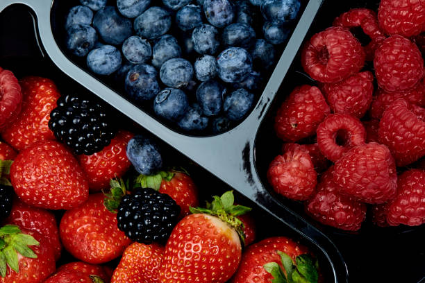 istock Fresh, beautiful, large raspberries blueberries, strawberries, blackberries 998313592