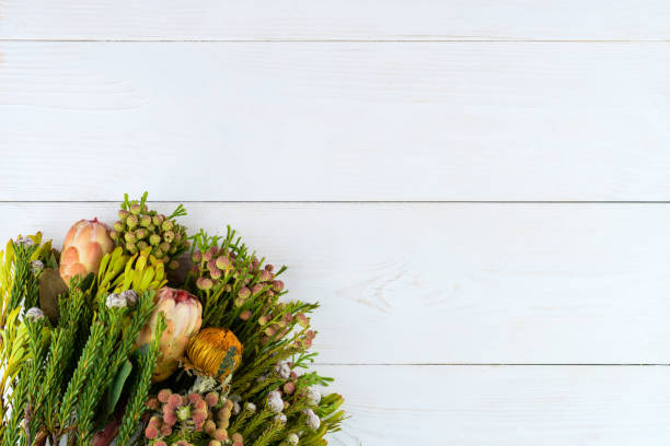 istock Green proteus bouquet on wooden background with copyspace for yo 998333404
