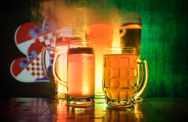 Beer glasses on table. Support your country with beer concept. Selective focus