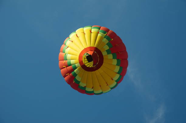 istock Beautiful balloon is flying through the sky 998336804