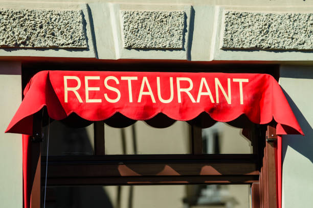 istock Restaurant sign on wall of building 998339042