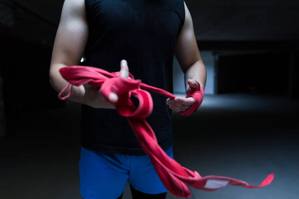 istock Young male boxer with bandage 998342638