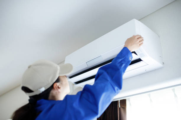 istock woman to check the air conditioner 998352988