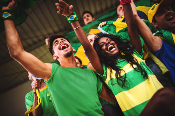istock brazilian supporters have fun at the stadium 998355396