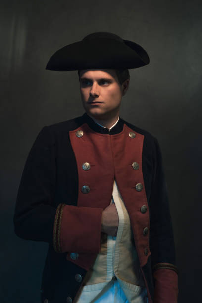 istock Historical regency man in hat holds hand in jacket. 998390260