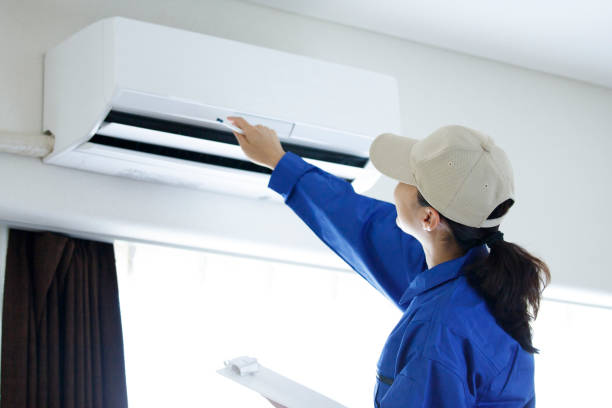 istock woman to check the air conditioner 998395688