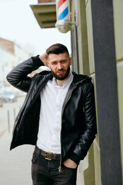 istock Man With Beard On Street Portrait 998404858