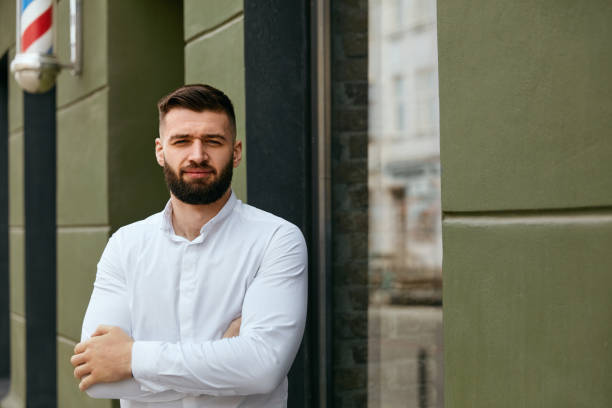istock Man With Beard On Street Portrait 998404944