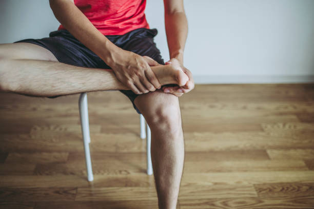istock Foot pain and men 998404976