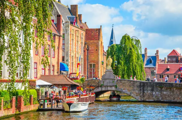 Photo of Beautiful canal and traditional houses in the old town of Bruges (Brugge), Belgium