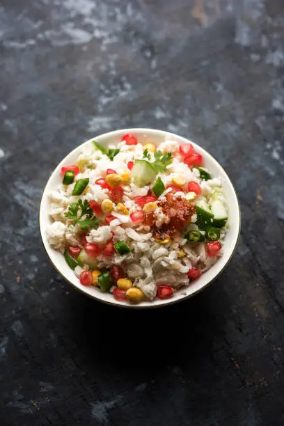 Photo of GopalKala or Dahi Kala is a prasad offered to lord Krishna on Janmashtami or Gokulashtami. Made using beaten rice, curd/milk, sugar, pomegranate, chilli , pickle and coriander