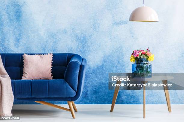https://media.istockphoto.com/id/998418950/photo/comfortable-plush-settee-with-pastel-cushion-and-a-side-table-with-fresh-flowers-in-a-vase.jpg?s=612x612&w=is&k=20&c=RMlMibgKnGwB0J3Lip5XWTyZjC5Ryn9fyluOExE8huc=