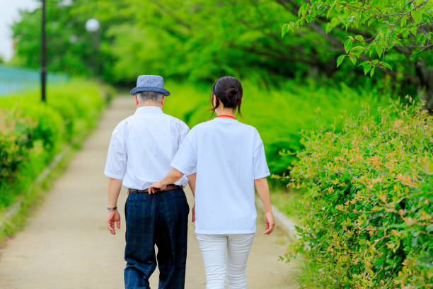 istock Caregiver and senior male 998419216