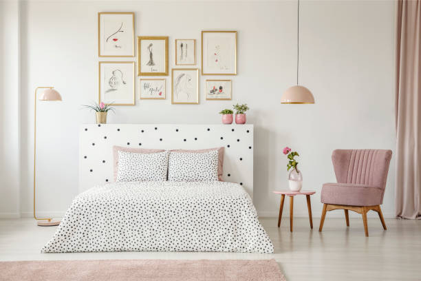 istock Pink woman's bedroom interior 998423074