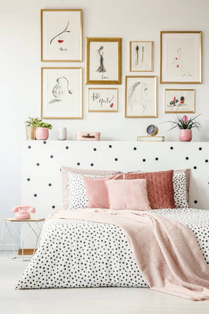 istock Woman's bedroom interior with posters 998423094