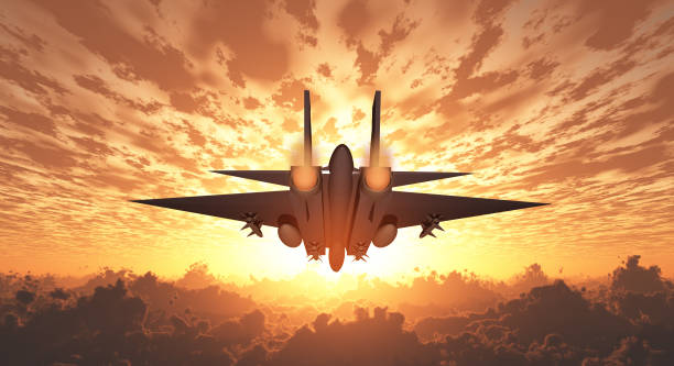 istock Military Jet  in Flight Sunrise or sunset 998428874